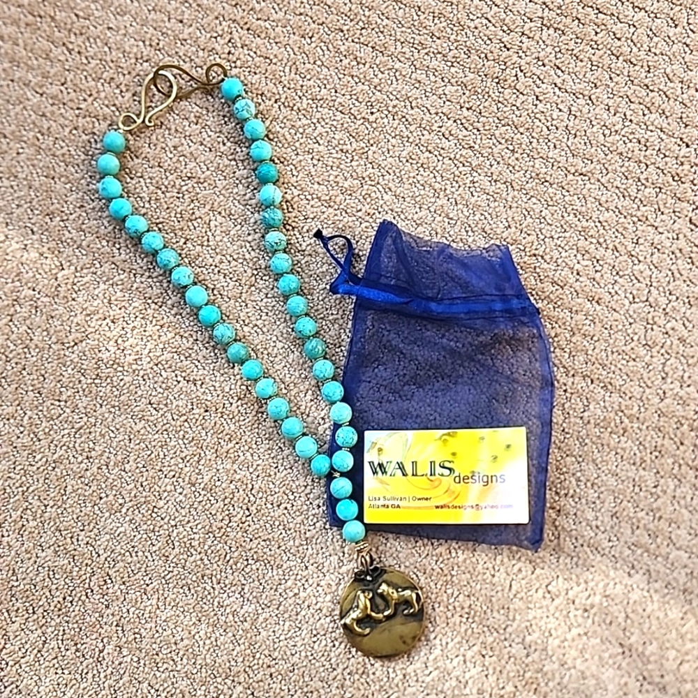 Wallis Designs gold look lion pendant turquoise bead necklace